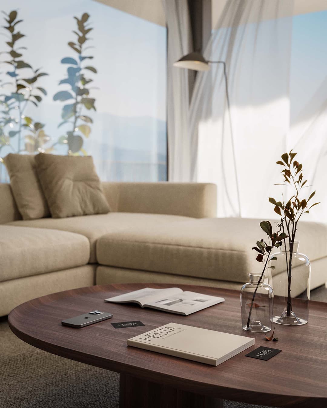 View of a living roomw with a table and sofa.